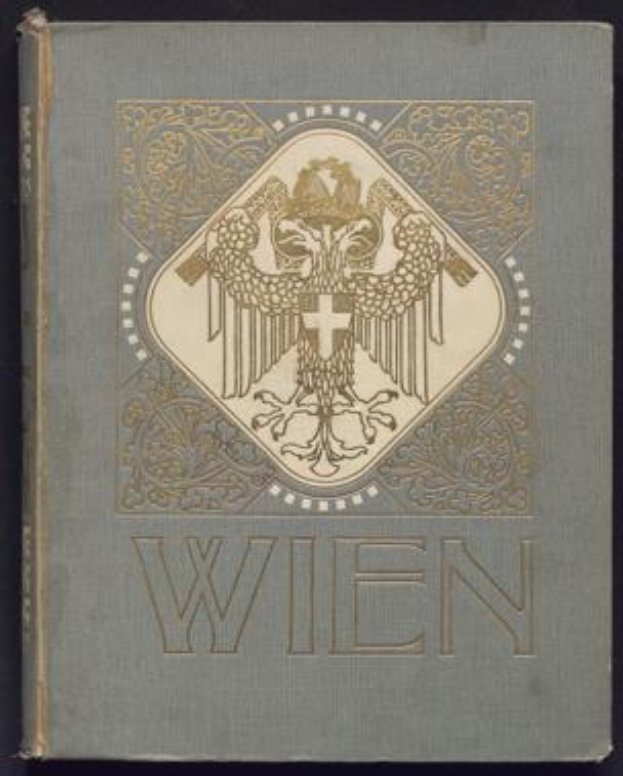 Ein Buch mit schwarzem Einband und einem goldenen Adler, betitelt "Wien", wahrscheinlich eine Geschichte des Deutschen Reichs.