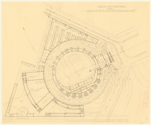 Schwarze-weißes architektonisches Zeichnung eines Stadiongrundrisses mit umliegenden Gebäuden und handschriftlichen Textanmerkungen.
