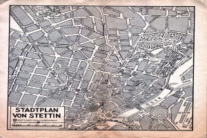Ein detaillierter alter Stadtplan von Stuttgart auf Papier, der Straßen, Gebäude, Sehenswürdigkeiten und begleitenden Text zeigt.