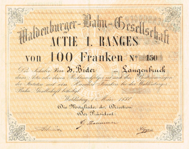 Ein altes deutsches Geldstück mit dem Porträt eines Mannes, auf dem steht: "Haldenburger-Balm Gesellschaft Actie 1 Ranges".