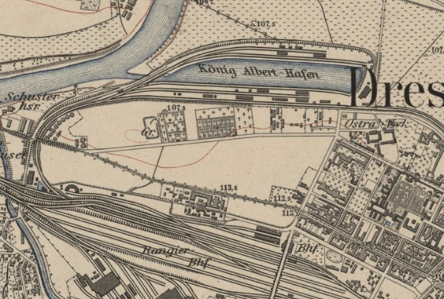 Ein detaillierter alter Stadtplan von Dresden, Deutschland, der einen Fluss, Gebäude, Straßen und Text zeigt.