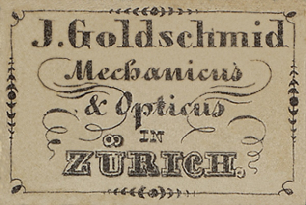 Alte Visitenkarte für "J. Goldschmidt Mechanicus & Optik in Zürich", wahrscheinlich aus dem frühen 20. Jahrhundert, mit einer Aufzählung der Unternehmensdienstleistungen.