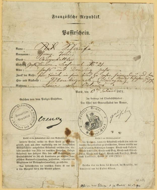 Alter deutscher Regierungsdokument mit einem runden, schwarz umrandeten Stempel auf vergilbtem Papier, geschrieben in schwarzer Tinte.