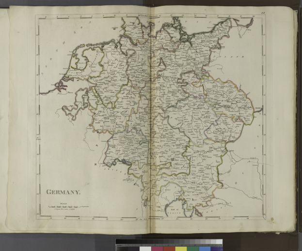 Ein aufgeschlagenes Buch mit einer detaillierten Deutschlandkarte und begleitendem Text.