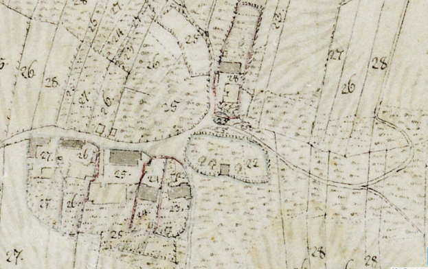 Ausführlicher alter Stadtplan mit Gebäuden, Straßen und Text, markiert für eine geplante Entwicklung.