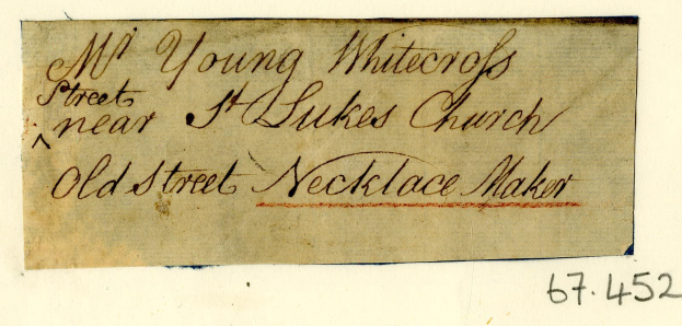 Altes, abgenutztes Papier mit verblasster Kursivschrift, das "Altstraße Halskettenschmiede" liest, leicht zerknittert mit verbleichter Schrift.