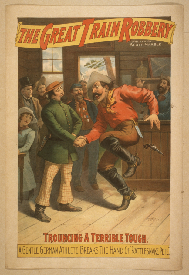 Ein Plakat, das eine Gruppe von Menschen auf einem Boden zeigt, einer mit einer Waffe in der Hand, mit Text oben und unten "Der große Zugür Diebstahl - Trouching ein Schreckliches Tough".